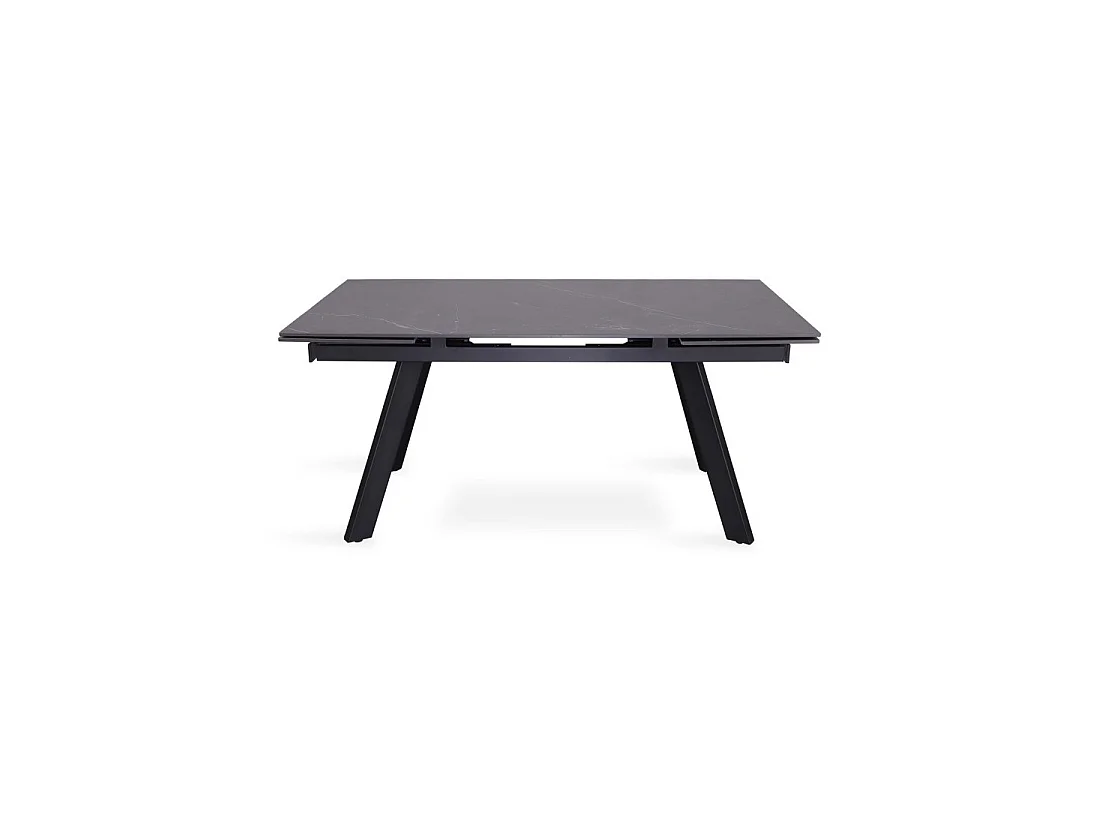 Table à manger extensible pour 10 personnes avec plateau en pierre noire collection LAROS. Structure en métal.