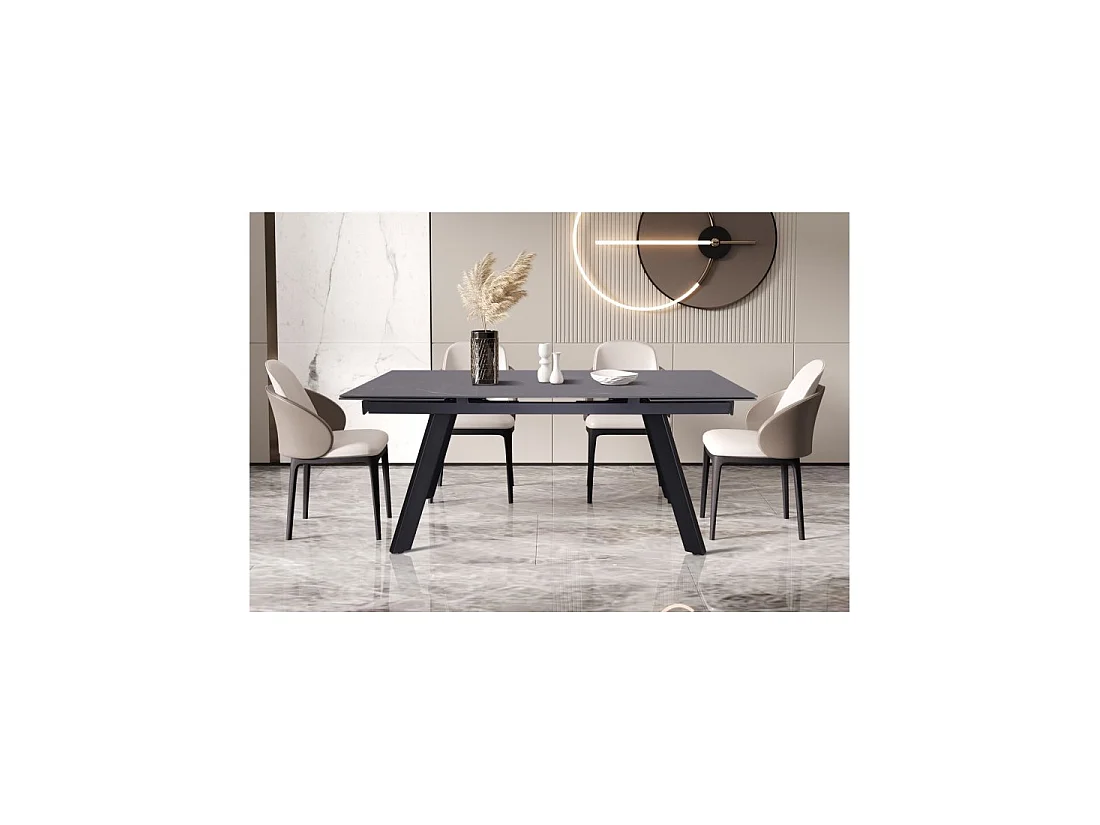 Table à manger extensible pour 10 personnes avec plateau en pierre noire collection LAROS. Structure en métal.