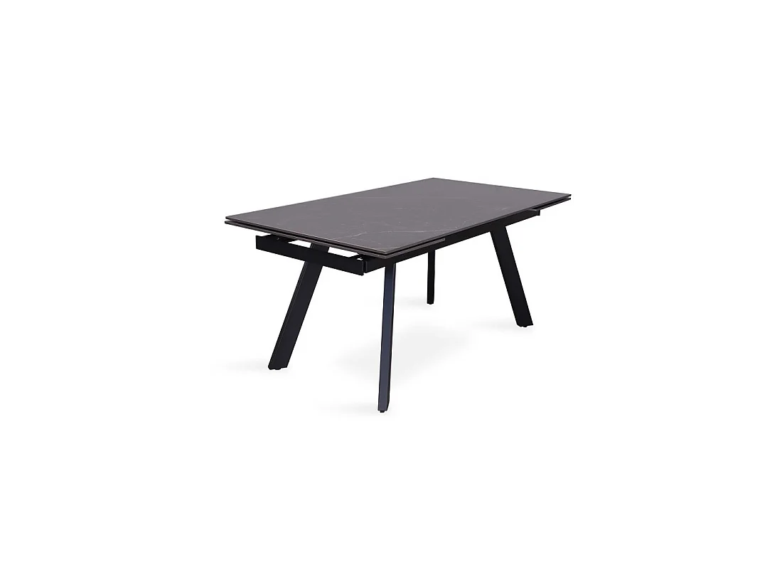 Table à manger extensible pour 10 personnes avec plateau en pierre noire collection LAROS. Structure en métal.