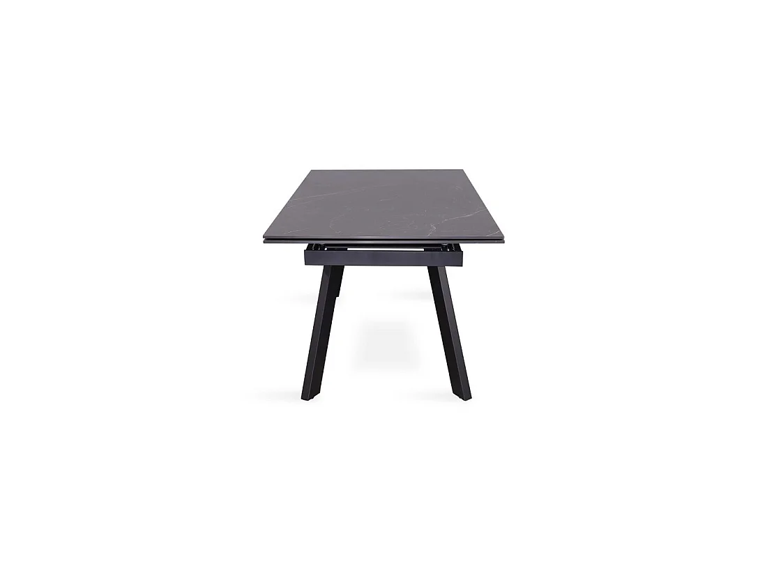 Table à manger extensible pour 10 personnes avec plateau en pierre noire collection LAROS. Structure en métal.