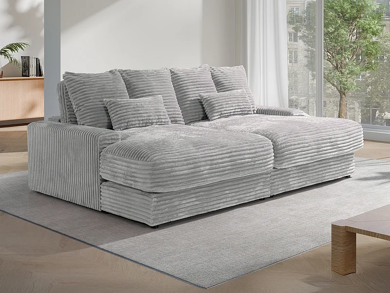 Comfortabele driezitsbank met diepe zitting van grijs ribfluweel met brede ribbels CALAZO van Pascal Morabito