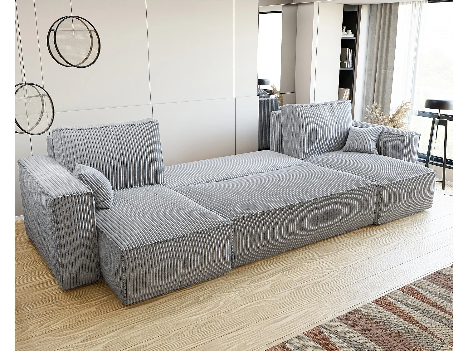 Ecksofa Paris U mit Schlaffunktion und grauem Stoff.