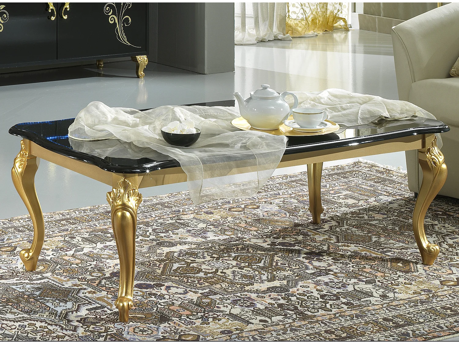 Table basse design bois vernis brillant noir et doré Jade 130cm