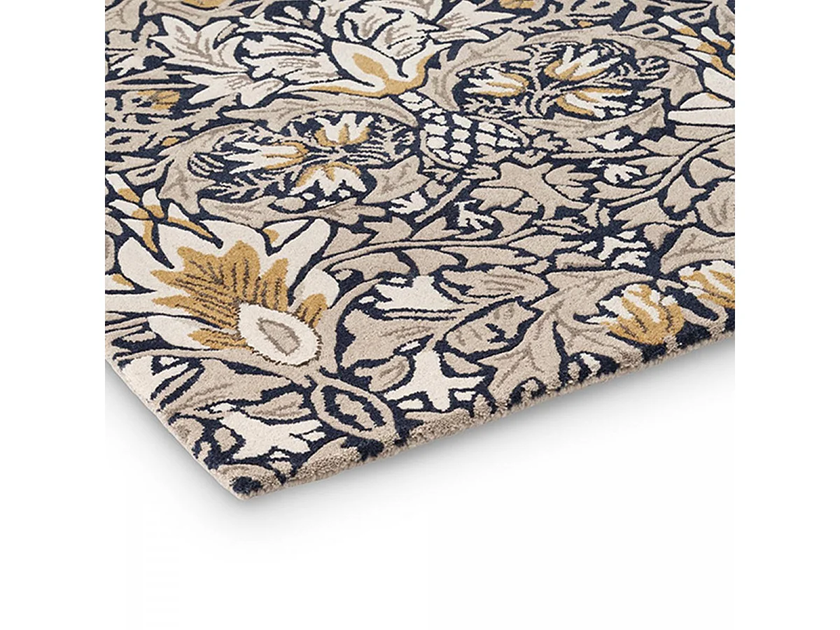 tapis chambre 170x240 fait à la main en laine indigo et beige motif floral