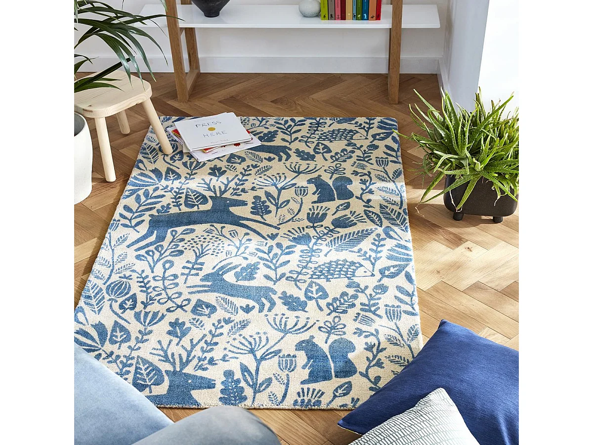 tapis grand salon 120x180 fait à la main en laine bleu rectangle motif animaux