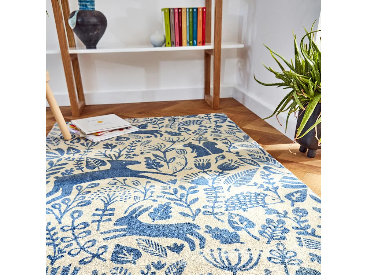 tapis grand salon 120x180 fait à la main en laine bleu rectangle motif animaux