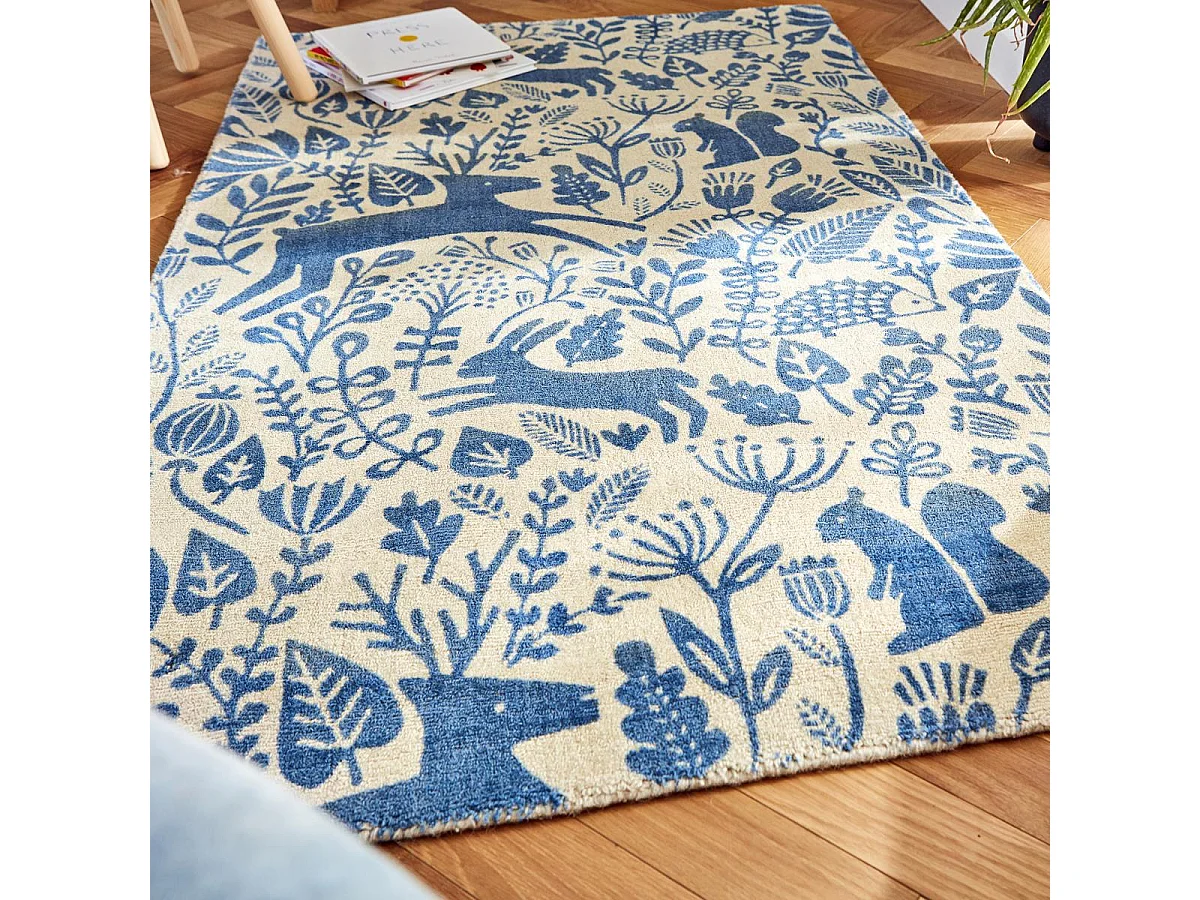 tapis grand salon 120x180 fait à la main en laine bleu rectangle motif animaux