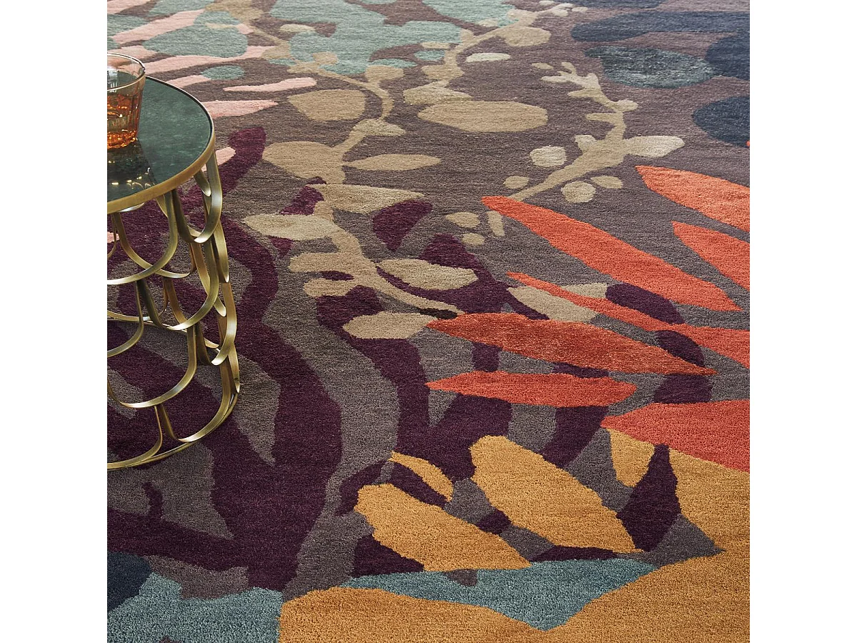 tapis salle à manger 250x350 tissé en laine noir et orange motif floral