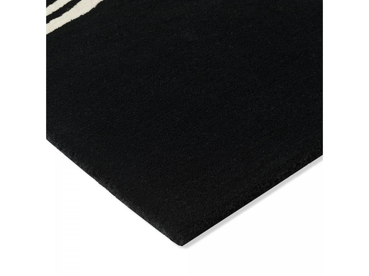 tapis bibliothèque 200x280 fait main en laine noir et blanc motif géométrique
