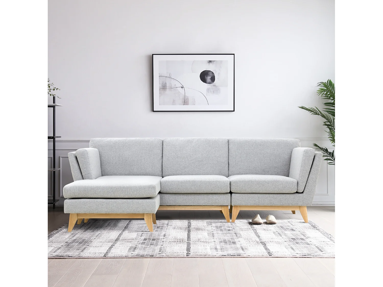 Divano angolare reversibile a 4 posti in tessuto grigio chiaro Norden