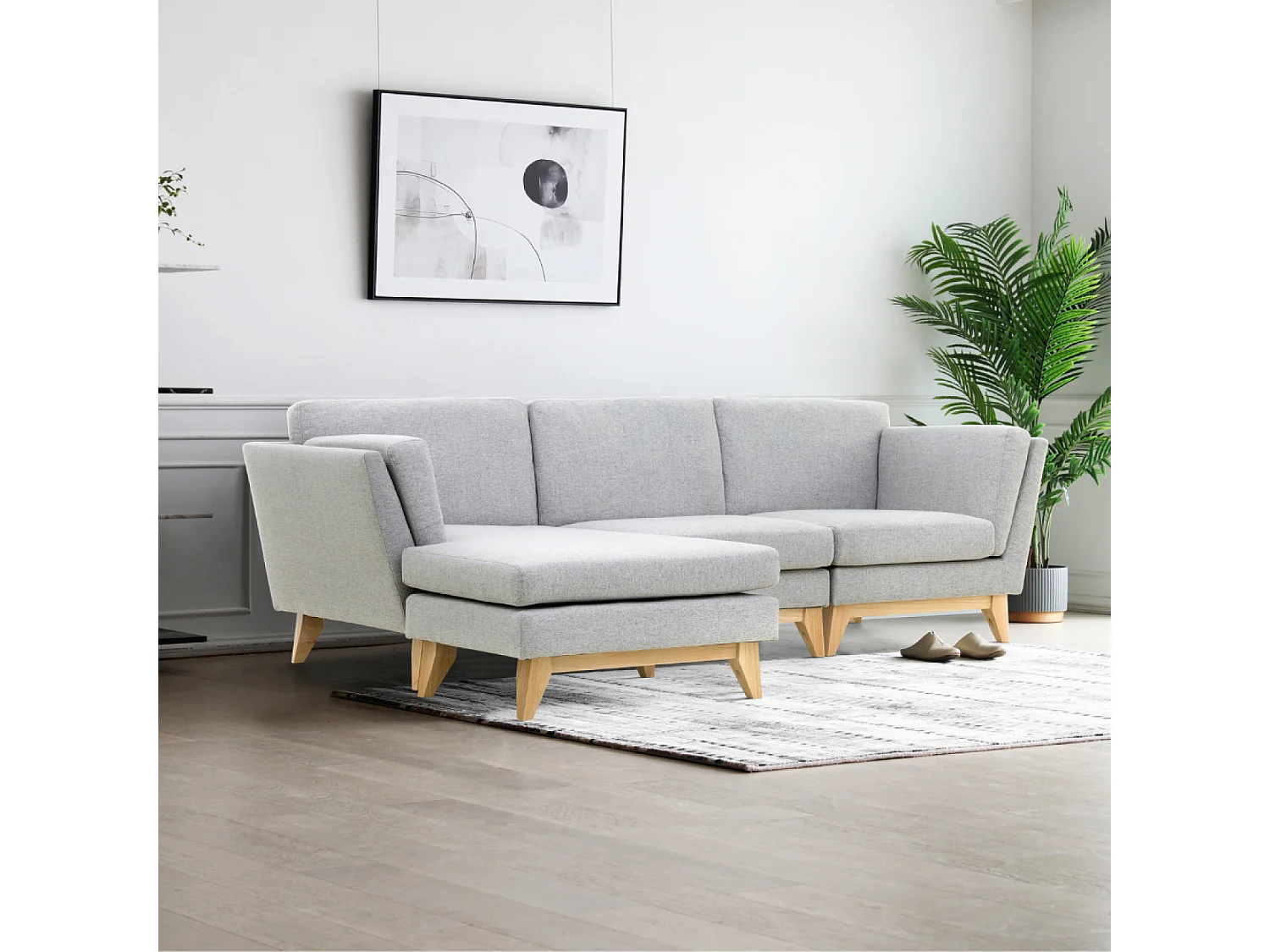 Divano angolare reversibile a 4 posti in tessuto grigio chiaro Norden