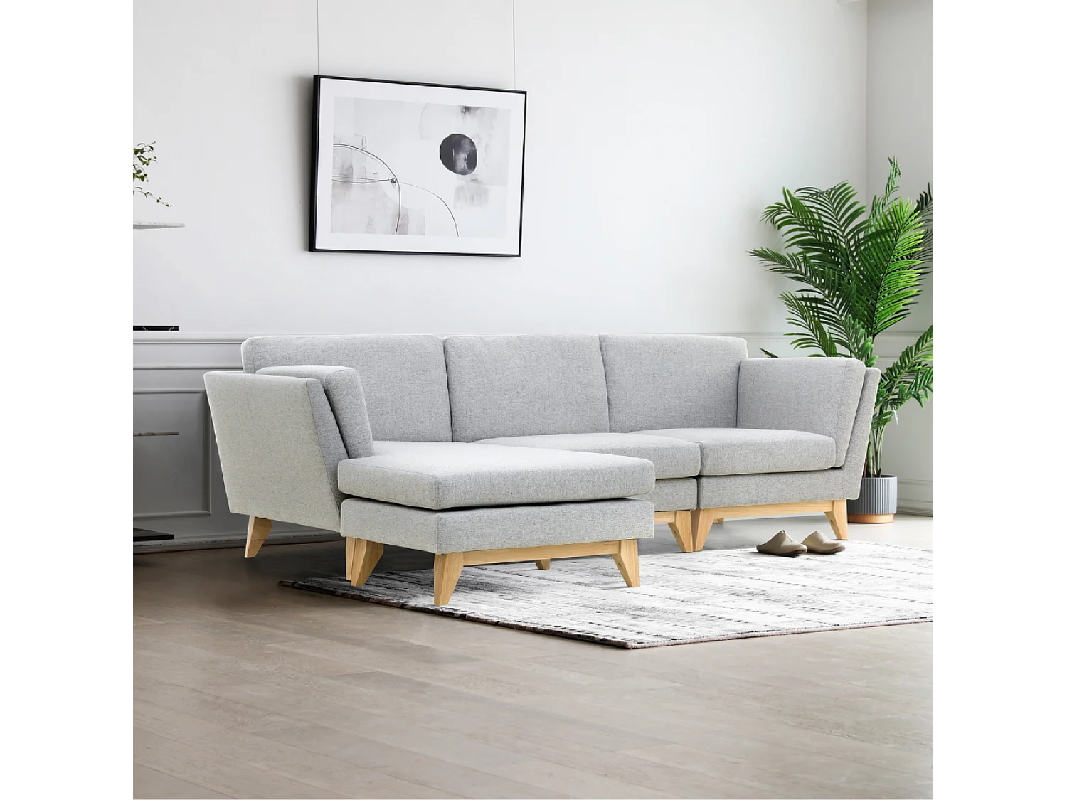 Canapé d'angle réversible 4 places en tissu gris clair NORDEN