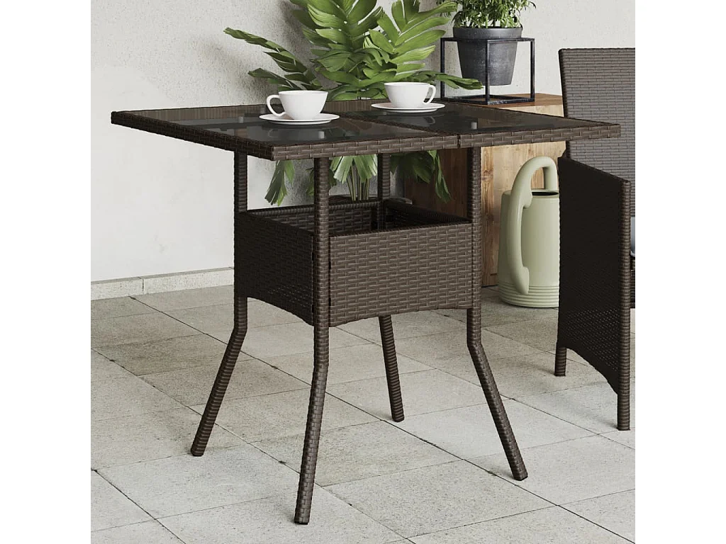 Table de jardin avec dessus en verre marron résine tressée