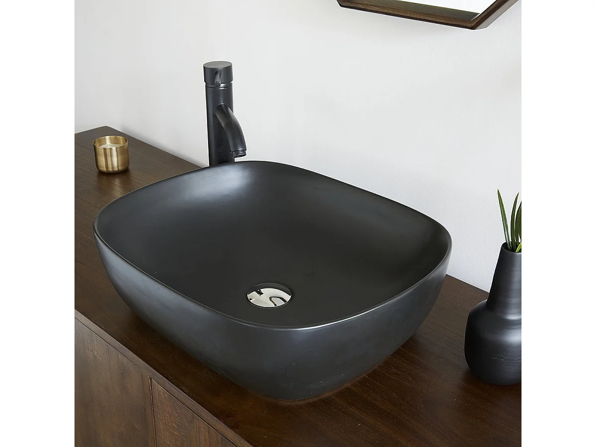Lavabo ovalado de cerámica negra