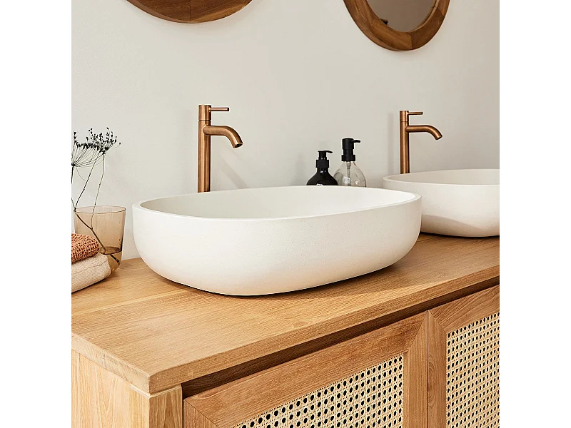 Lavabo ovalado de hormigón beige