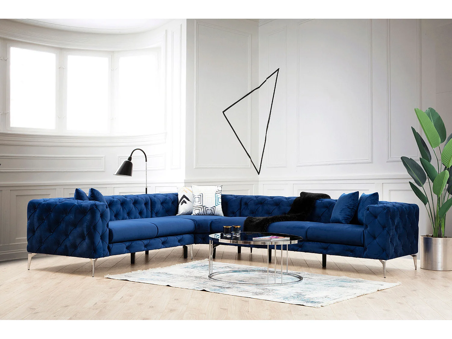 Canapé d'angle droit capitonné velours bleu marine et pieds chromés Herakles 270cm