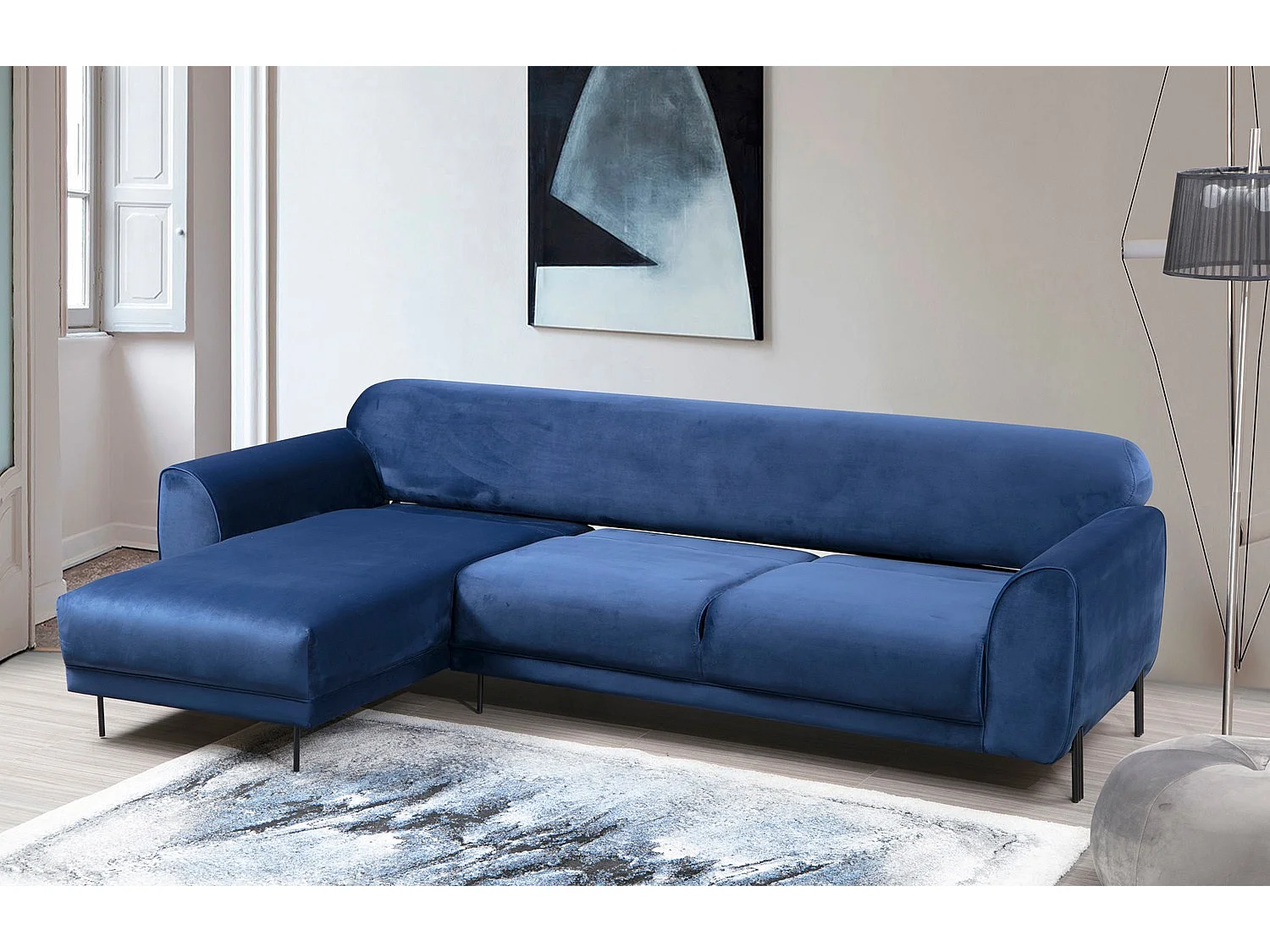 Canapé d'angle gauche design velours bleu marine et pieds acier noir Liza