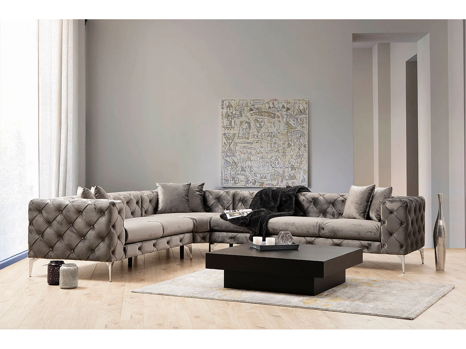 Canapé d'angle gauche capitonné velours gris foncé et pieds chromés Herakles 270cm