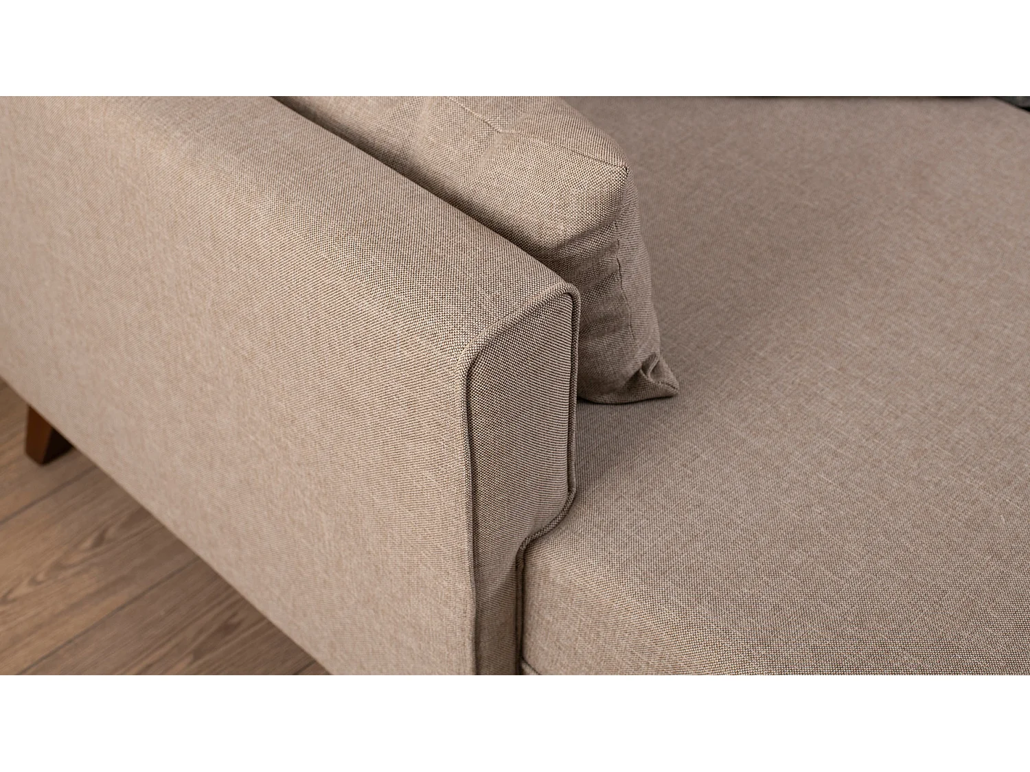 Kleine hoekbank links met beige Kandy stoffen poef 205 cm