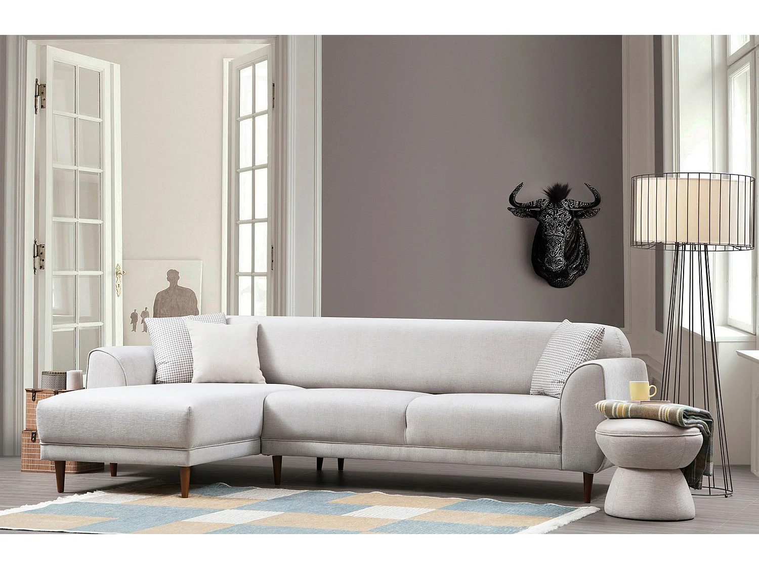 Canapé d'angle gauche design velours beige et pieds acier noir Liza