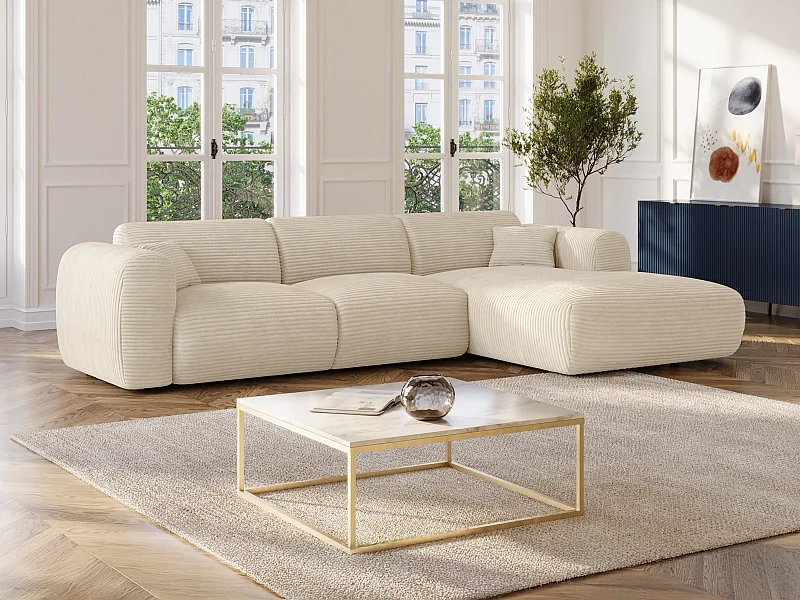 Grote hoekbank met hoek rechts van beige ribfluweel POGNI van Maison Céphy