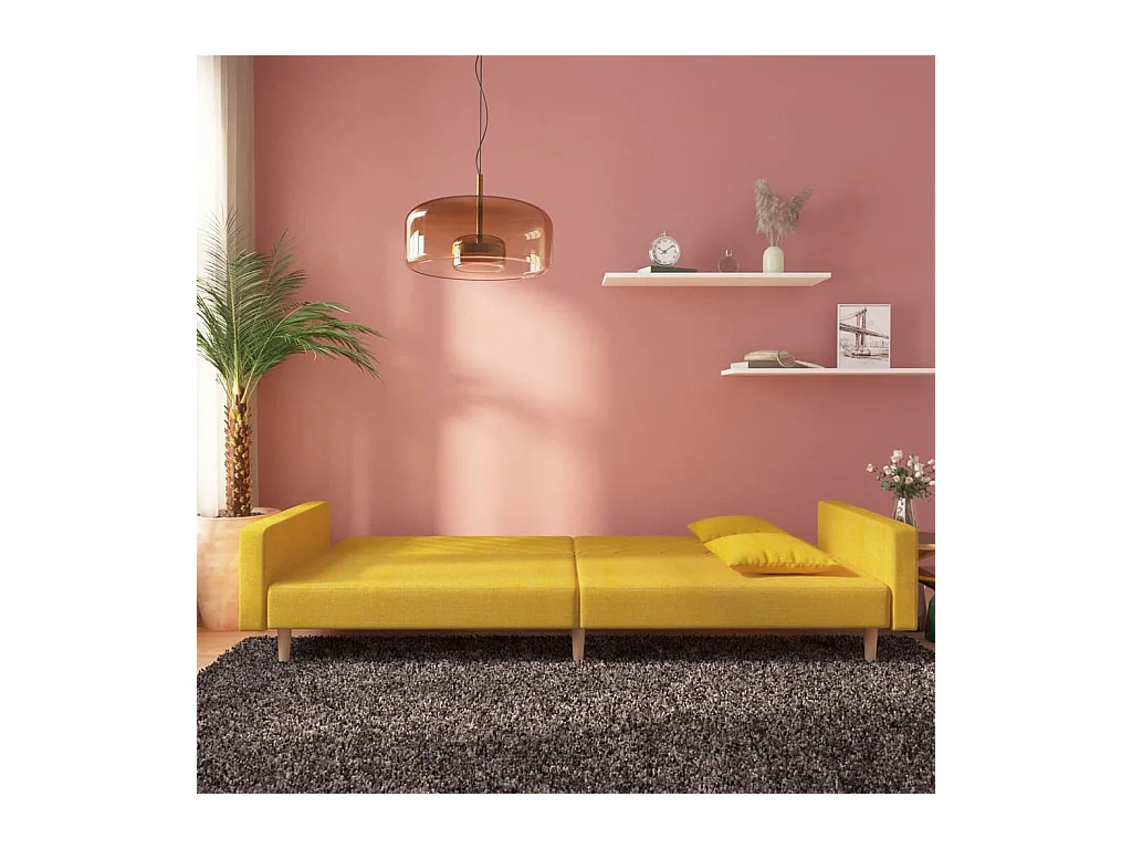 Canapé-lit à 2 places avec deux oreillers jaune tissu