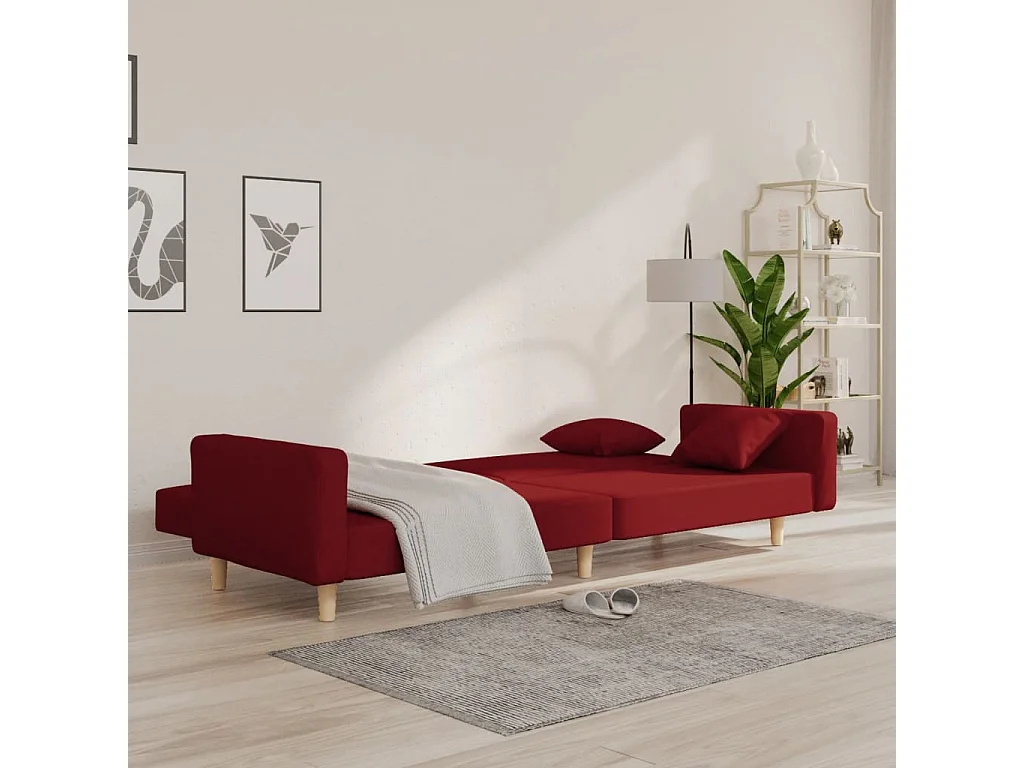 Canapé-lit à 2 places avec deux oreillers rouge bordeaux tissu