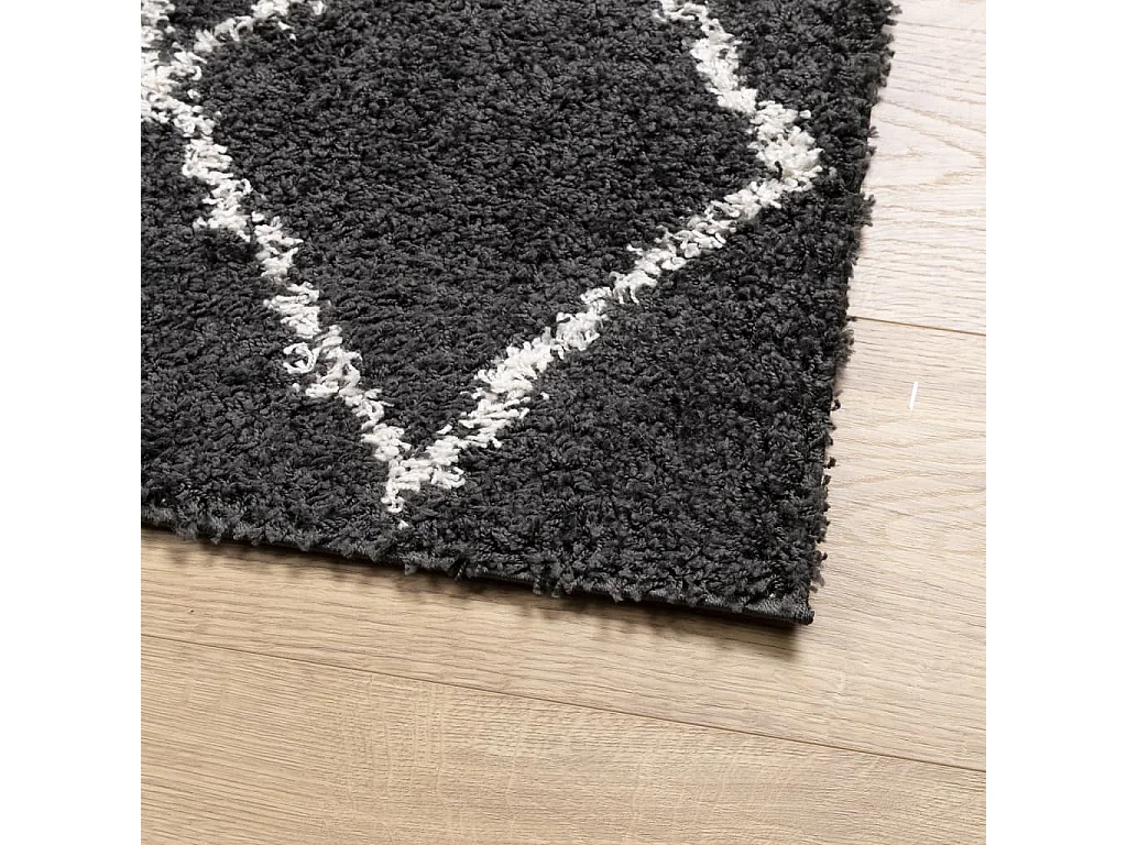 Alfombra de pelo largo moderna negro y crema 60x110 cm