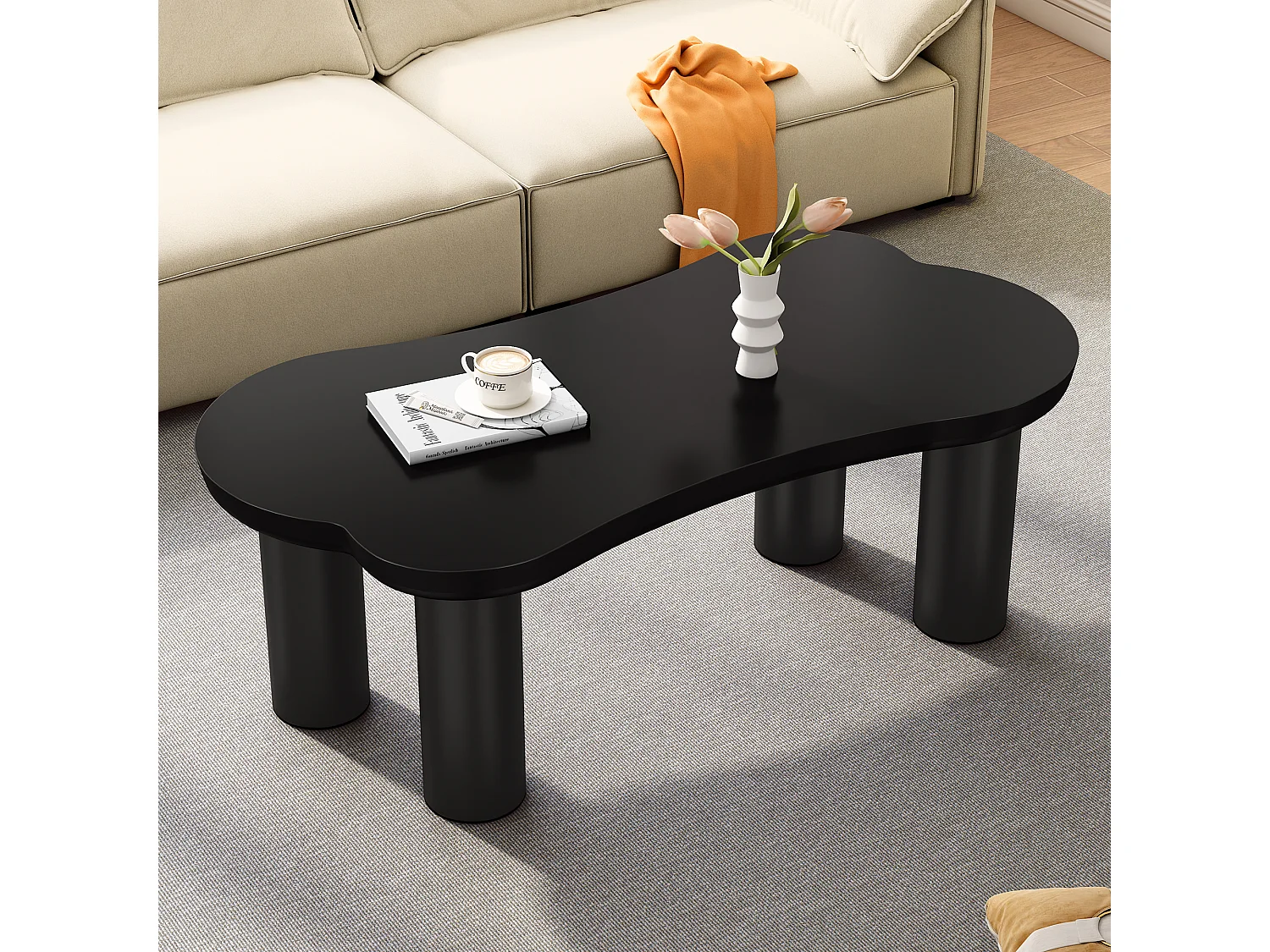 Onregelmatige salontafel in beenvorm - 113 x 58 x 40,5 cm - MDF blad en PVC poten - Zwart