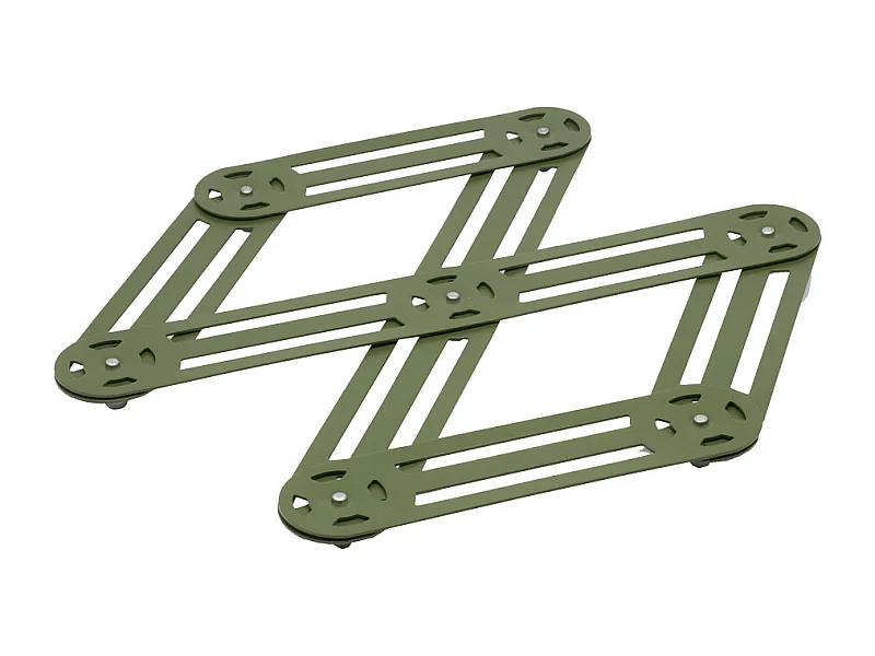 Le dessous de plat étirable en cuivre 25x12 cm de chez Roger Orfevre allie éléga