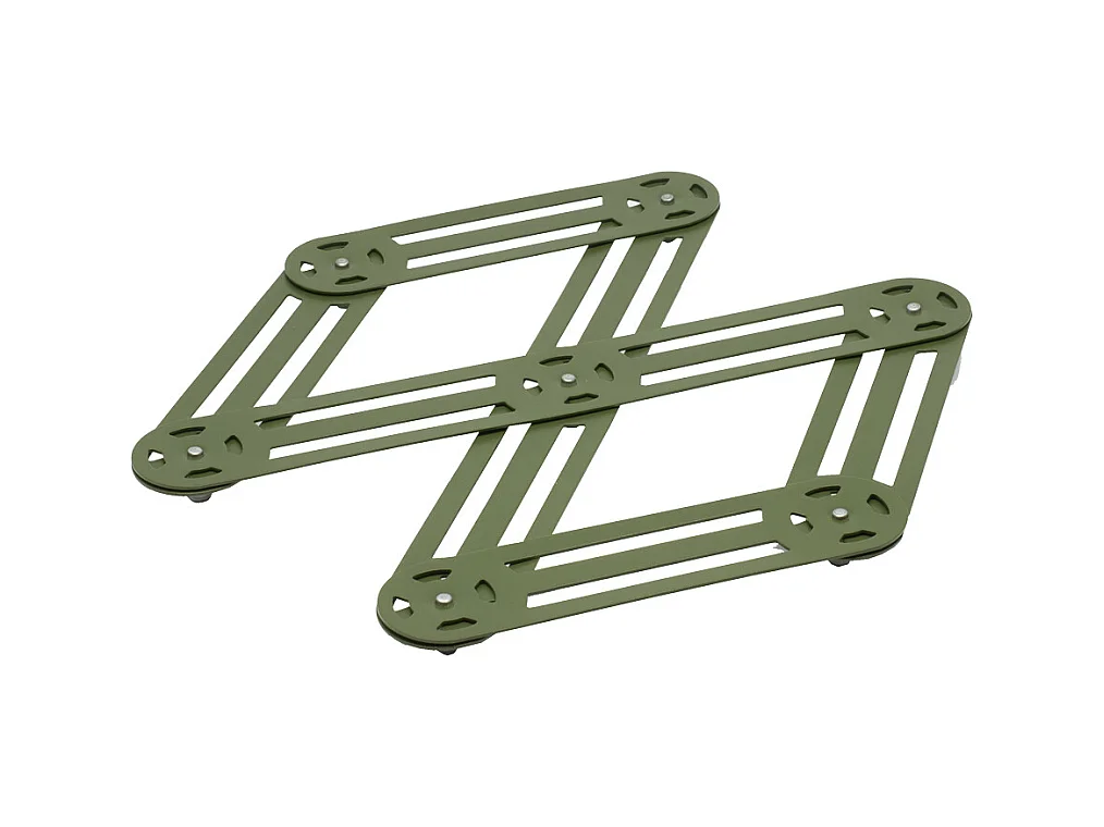 Le dessous de plat étirable en cuivre 25x12 cm de chez Roger Orfevre allie éléga