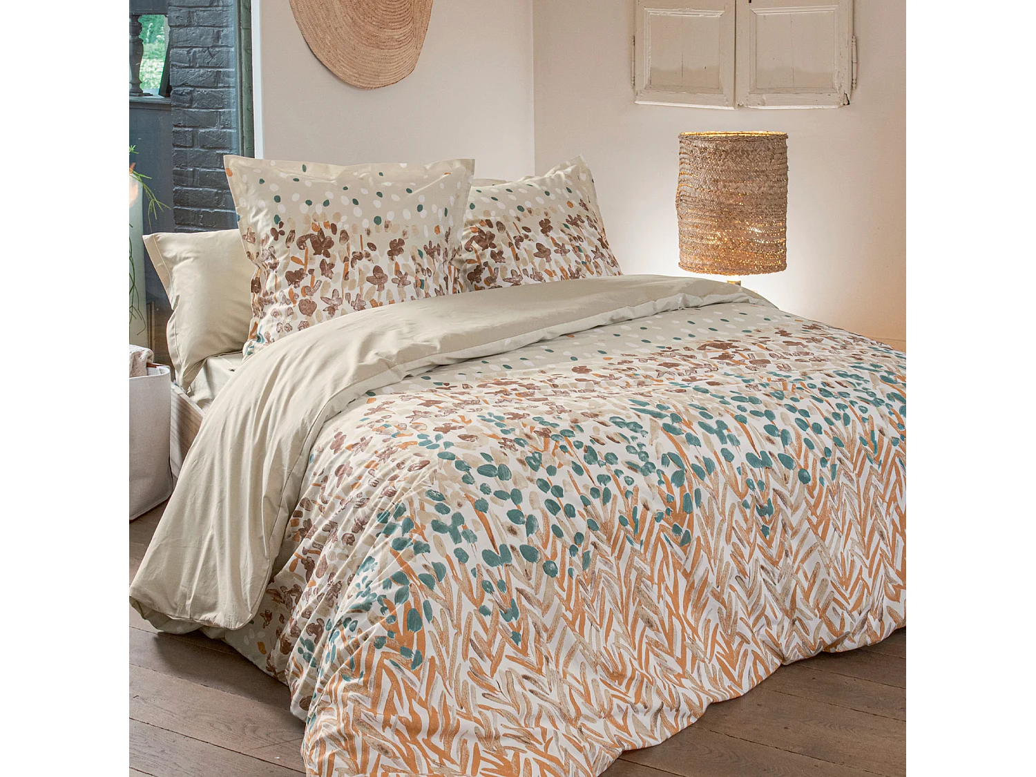 Bettwäsche aus Baumwolle mit stilisiertem Blumenmuster und Kissenbezügen