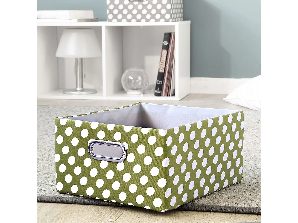 Lade met groene stof en witte stippen