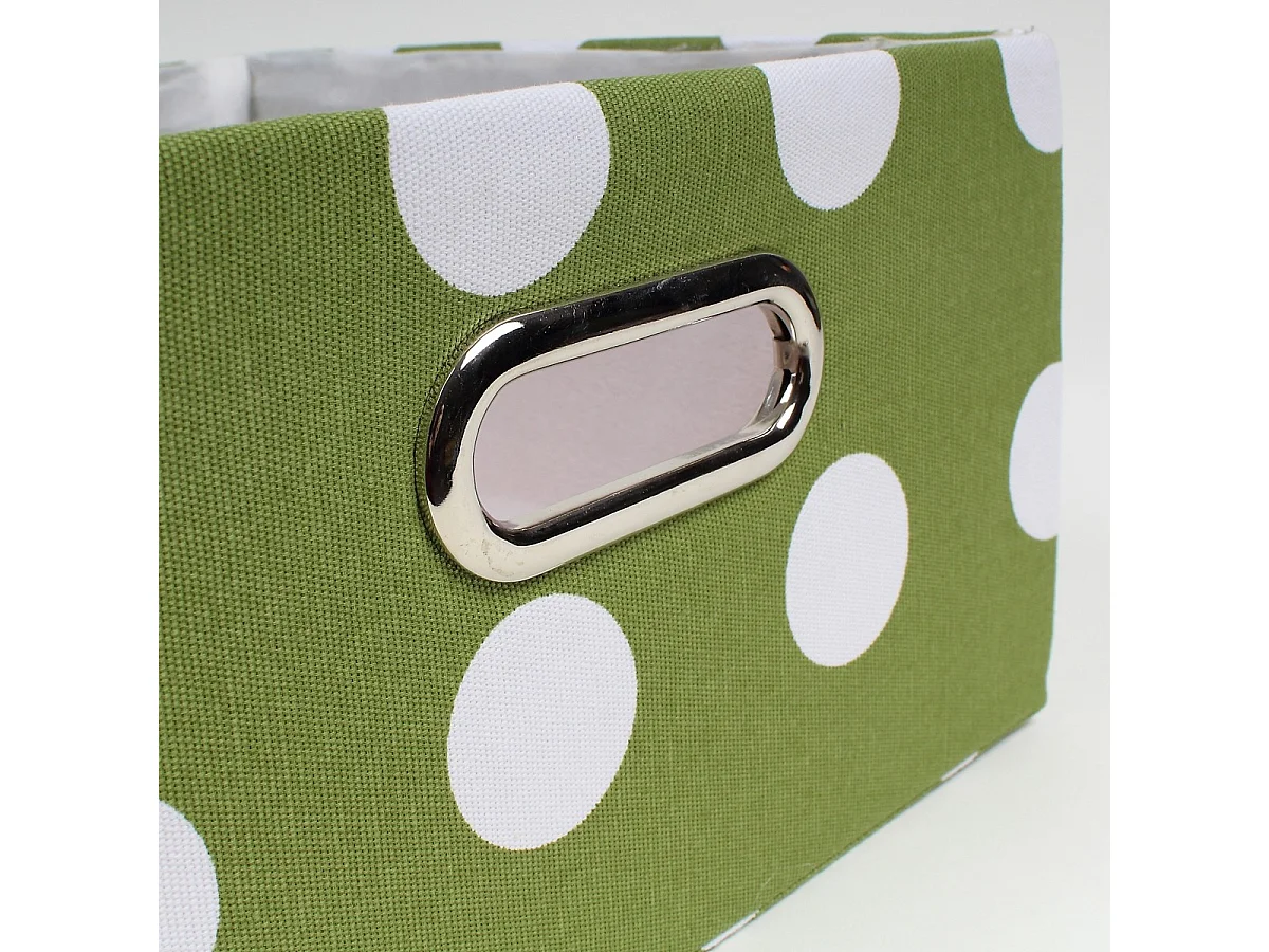 Lade met groene stof en witte stippen