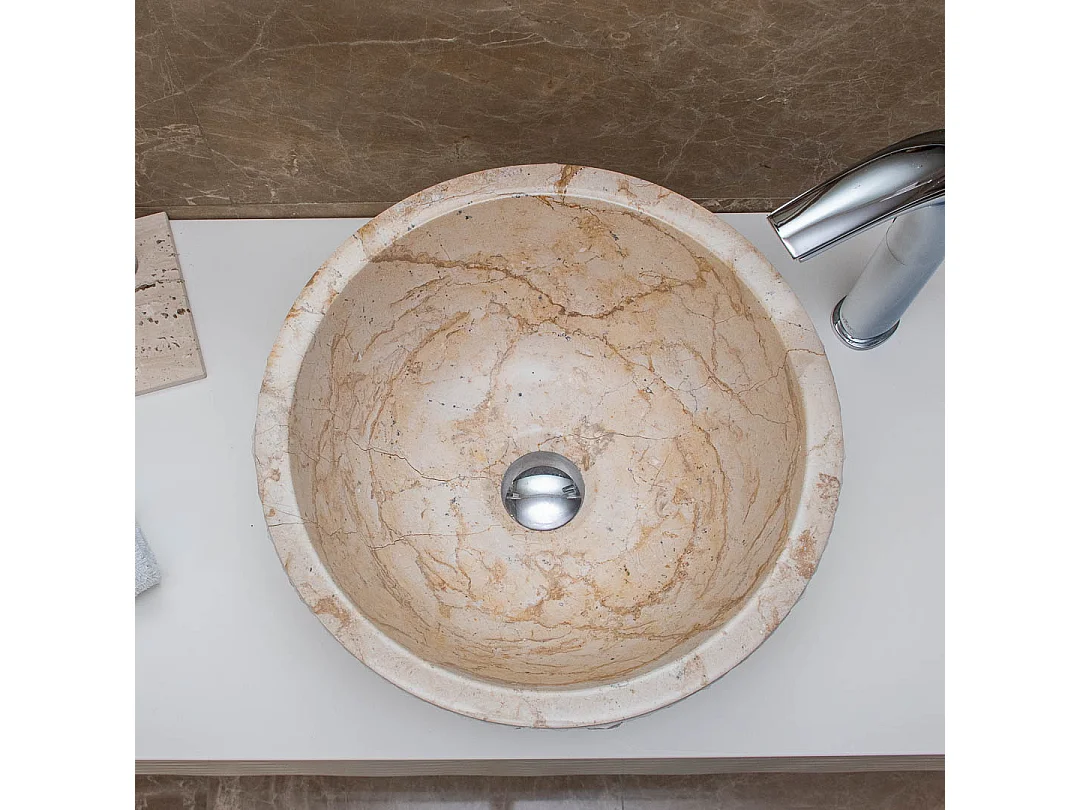 Lavabo de mármol beige tallado a mano