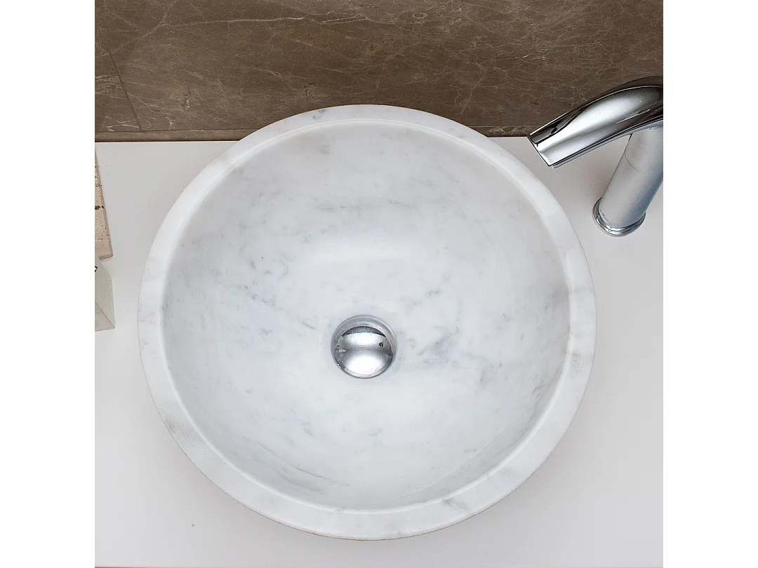 Lavabo redondo de mármol hecho a mano para un toque de lujo intemporal