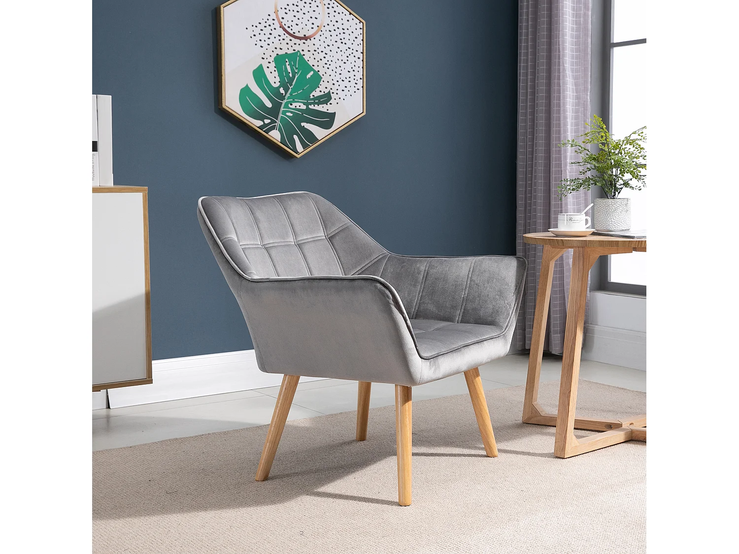 Fauteuil salon design scandinave - dossier accoudoirs enveloppant - piètement bois hévéa velours effet capitonné gris