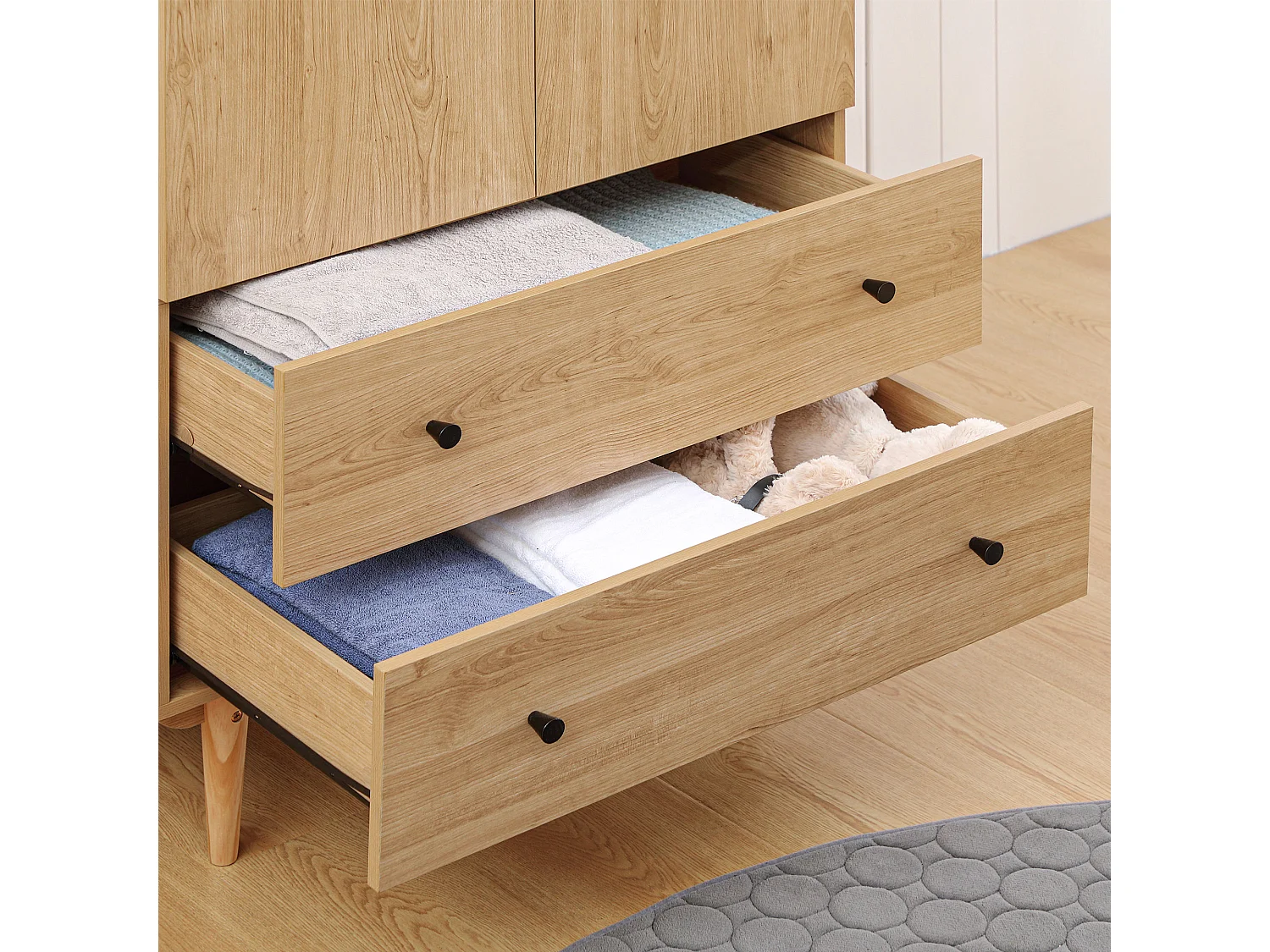 Armoire design scandinave - 2 portes, penderie, 2 tiroirs - piètement bois de pin panneaux aspect bois clair