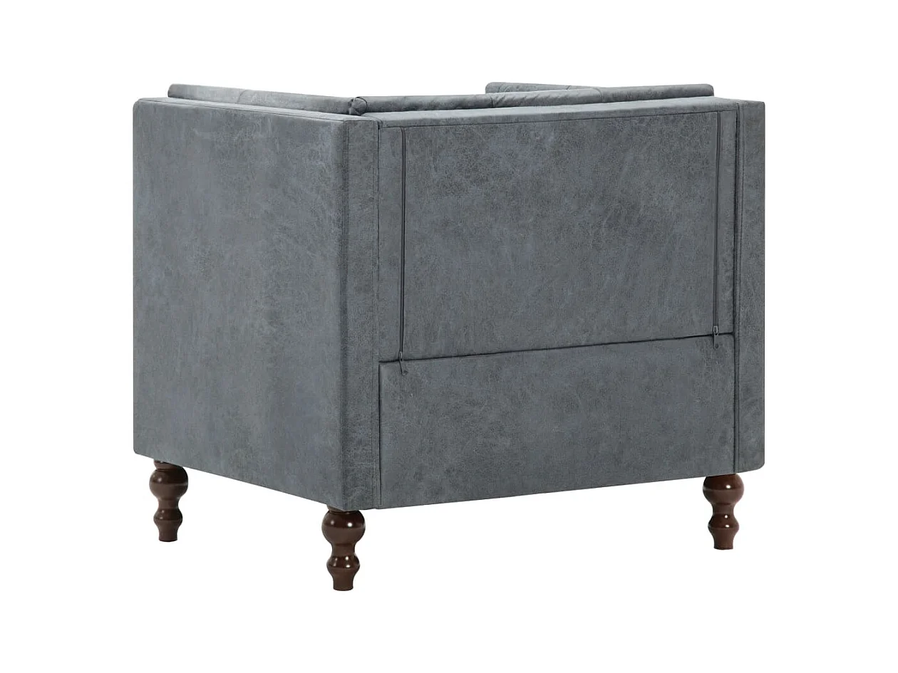 Sillón tapizado de tela gris