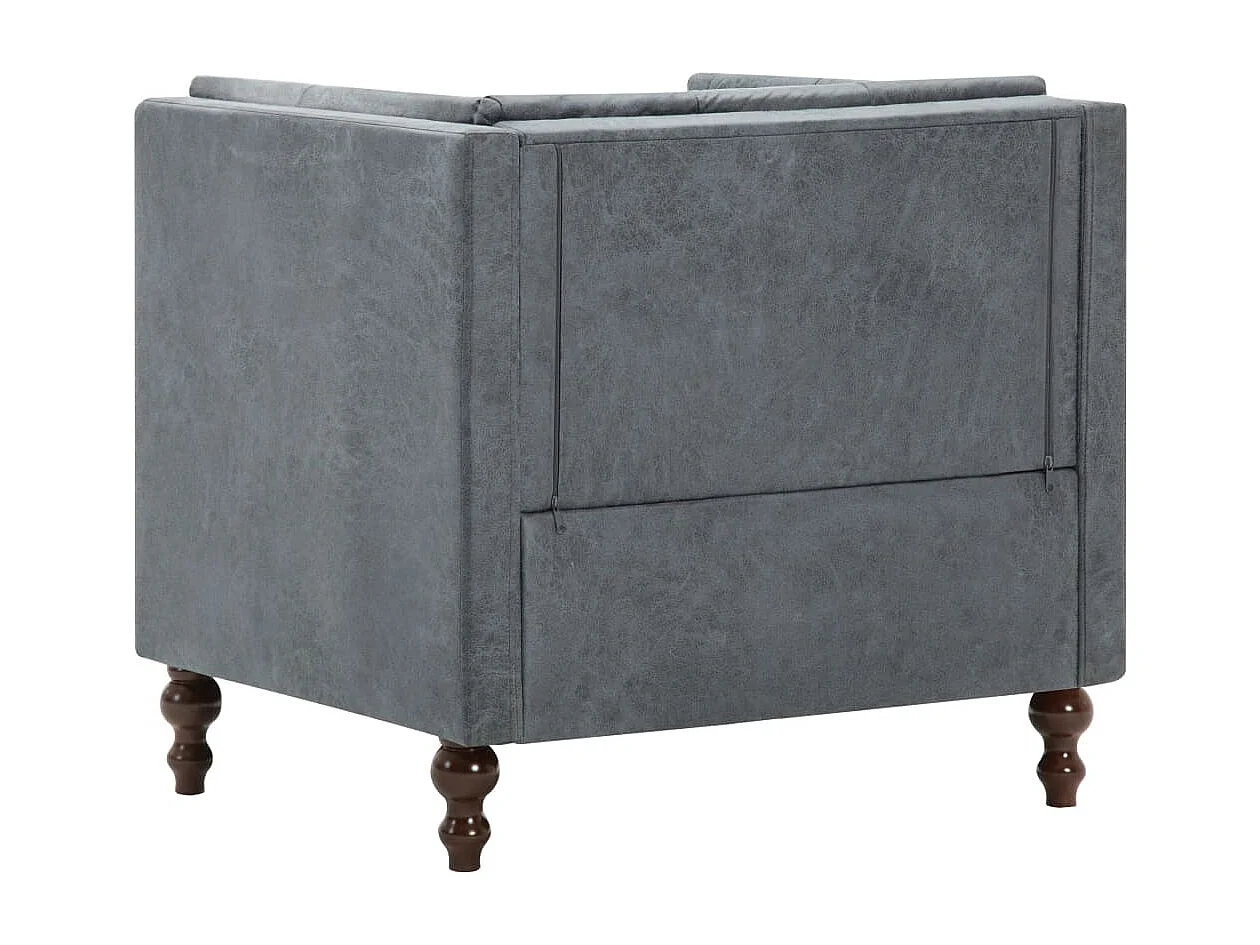 Sillón tapizado de tela gris