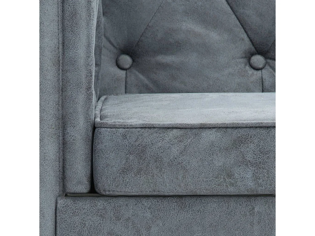 Sillón tapizado de tela gris