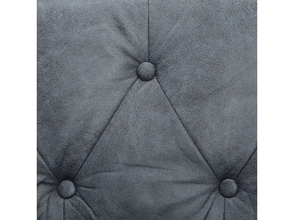 Sillón tapizado de tela gris