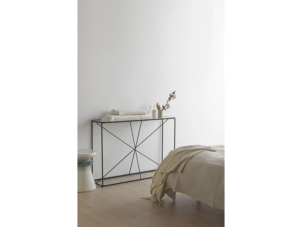 Table console en métal noir avec plateau en verre