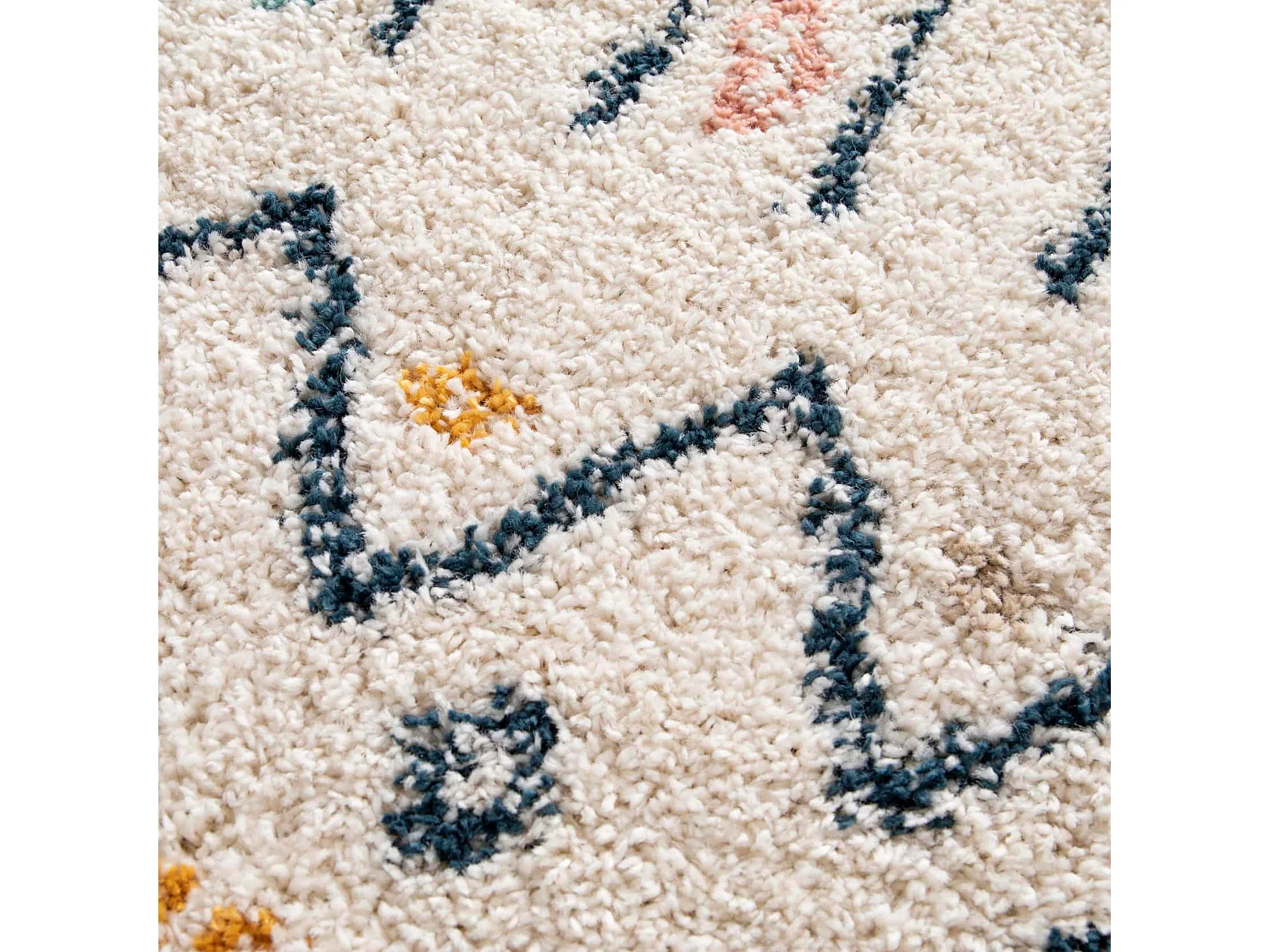 Tapis rectangulaire à poils longs motif ethnique beige 120x170 cm