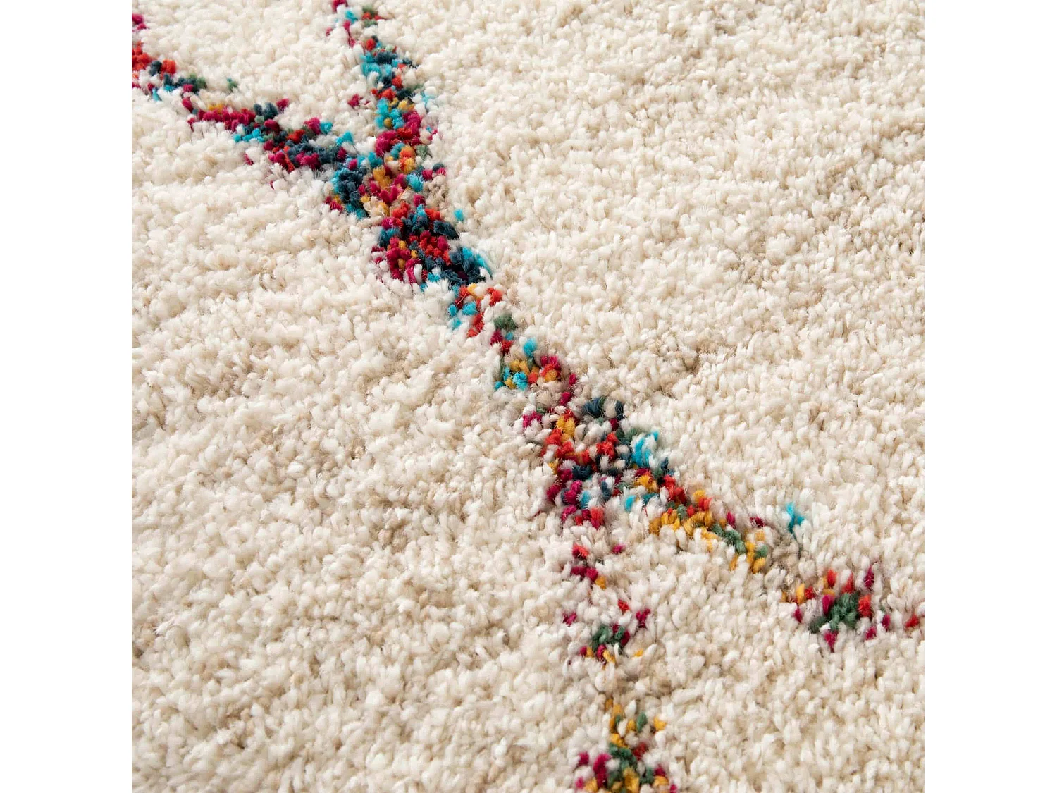 Tapis rectangulaire à poils longs motif ethnique beige 120x170 cm