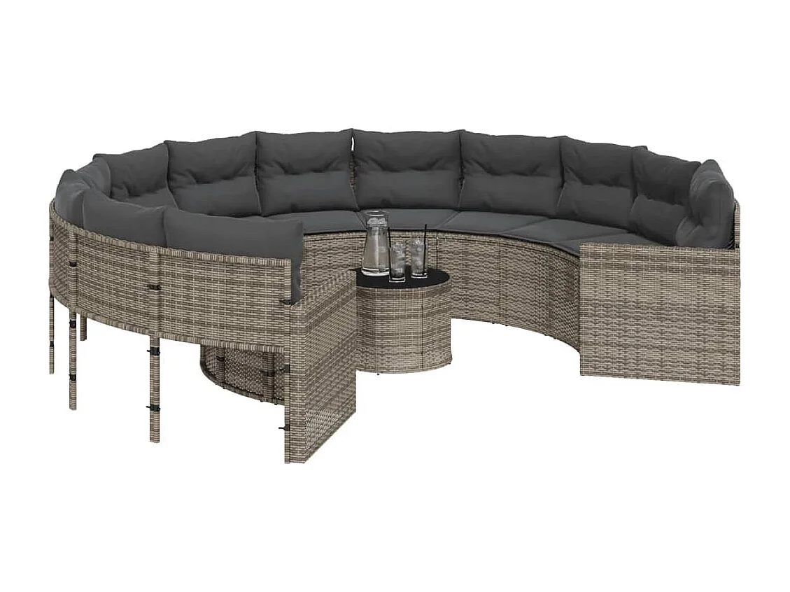 Sofá de jardín con mesa redonda con cojines de resina tejida en gris.