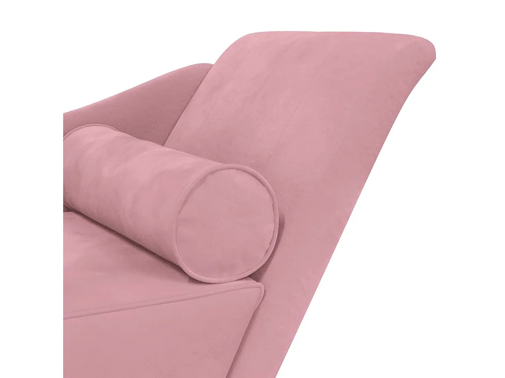 Sillón con cojines de terciopelo rosa.