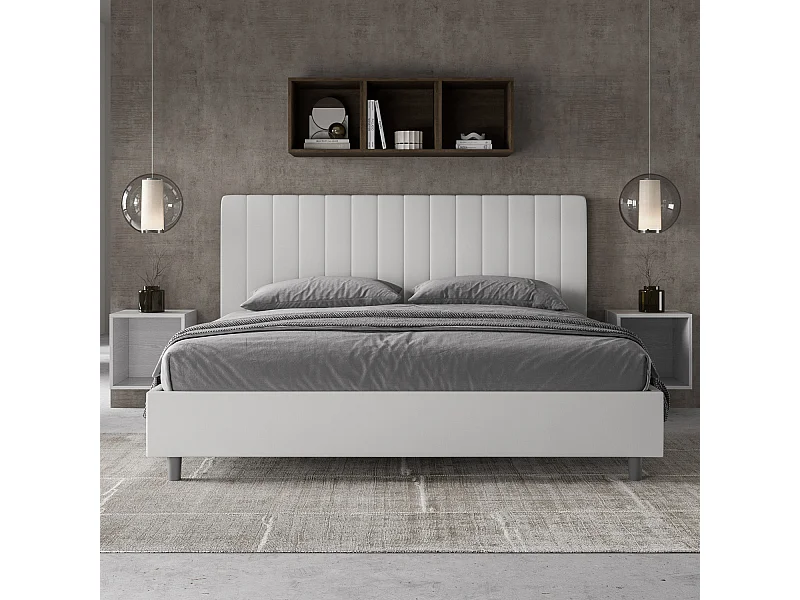 Łóżko wyposażone w stelaż z listwami z pojemnikiem tapicerowane 200x210 sztucznej skóry biały Agueda
