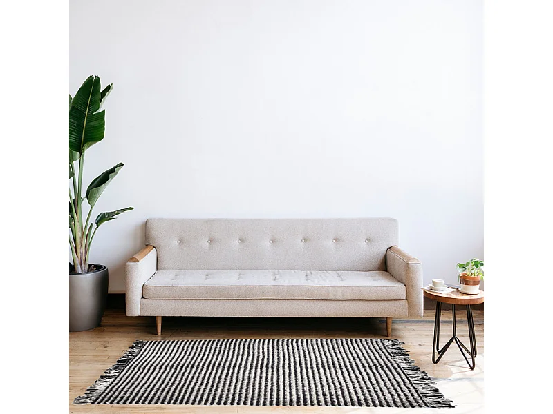 Tapis 140 x 200 cm texturé noir et blanc avec franges bicolores – SOHO