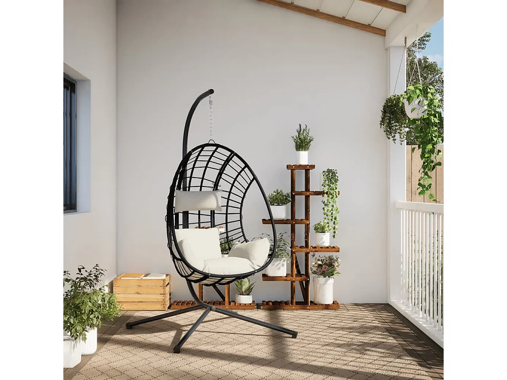 Eivormige hangstoel en beige rotan en stalen steun